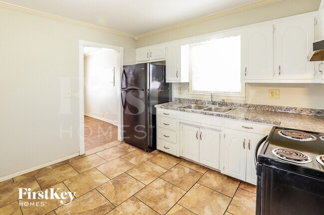 Foto del edificio - 7704 E 48th St