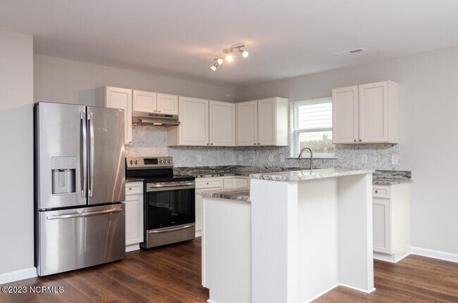 Foto del edificio - 6516 Rustling Leaves Way