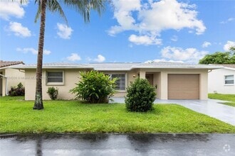 Building Photo - 7312 NW 58th Ct