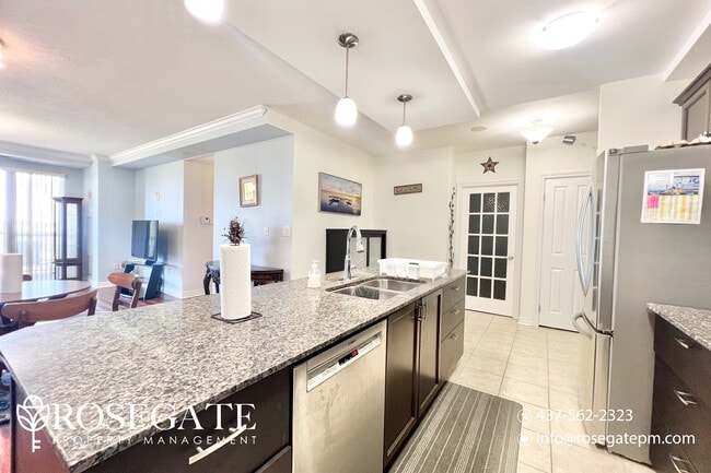 Building Photo - Modern 2-Bedroom + Den Condo with Stunning...