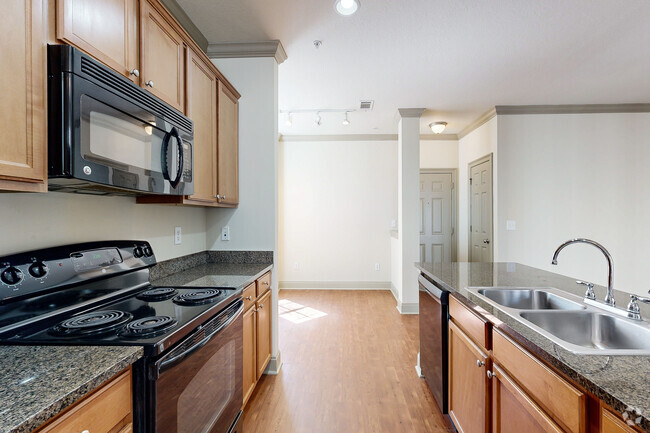 3BR, 2BA - 1,378SF - Kitchen & Dinning Area - The Lakes At Turtle Creek Apartment Homes