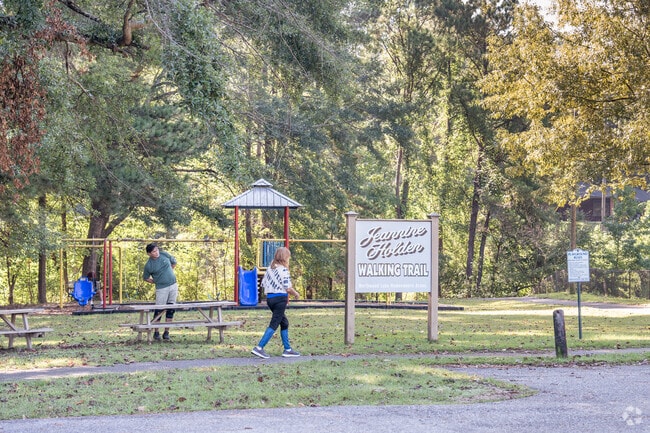 Visitors exercise at Holdon Park by Northwood Lake.