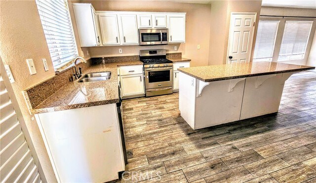 Building Photo - 8819 Dahlia Dr