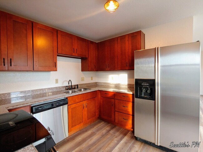 Foto del edificio - "Spacious 3-Bed Oasis with 2 Full Baths in Prime Seattle Location – 1800 Sq Ft of Comfort!"