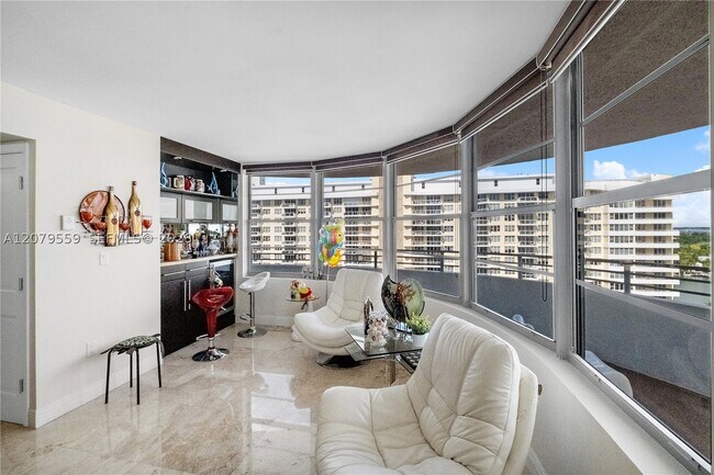 Building Photo - 5555 Collins Ave
