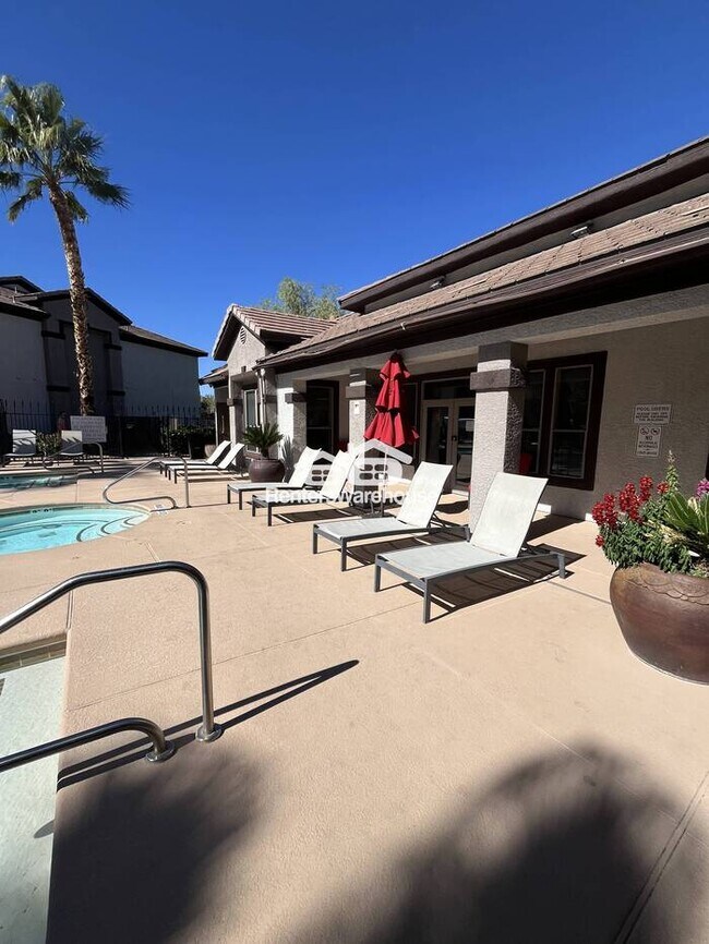 Building Photo - $500 move in rent concession. Spacious two-bedroom two-bathroom home in a gated community with pool.
