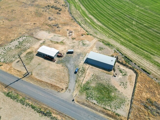 Building Photo - Country Living with a Huge Shop - 3BR on Acreage, Livestock Welcome!