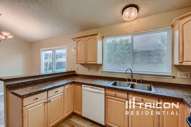 Foto del edificio - 11897 W Bowles Cir