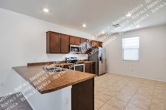 Building Photo - 6325 S Crescent Peak Dr