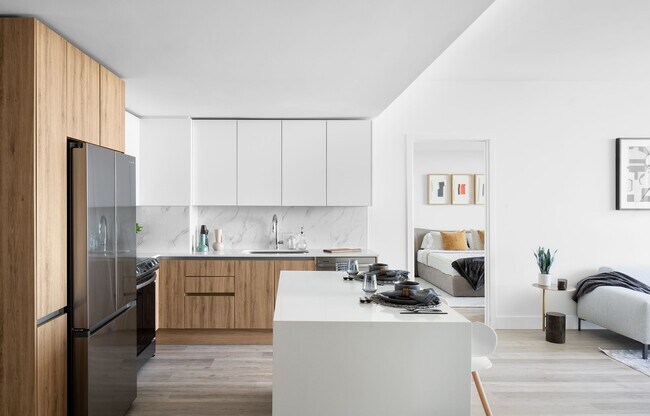 Disfrute cocinando en nuestras cocinas cuidadosamente diseñadas con acabados de alta calidad. - Cascade Link at Douglas