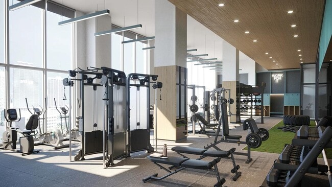 Club-quality fitness studio with TRX station accessible 24/7 at Modera Riverside in Miami, FL. - Modera Riverside