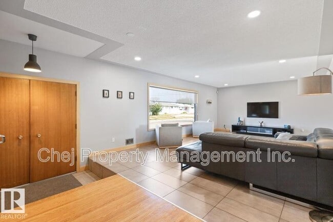 Building Photo - 8007-8128 128 Ave NW