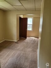 Building Photo - 1112 S Harlan Ave