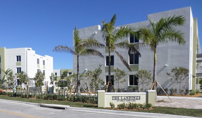 Building Photo - The Landings at Coral Town Park