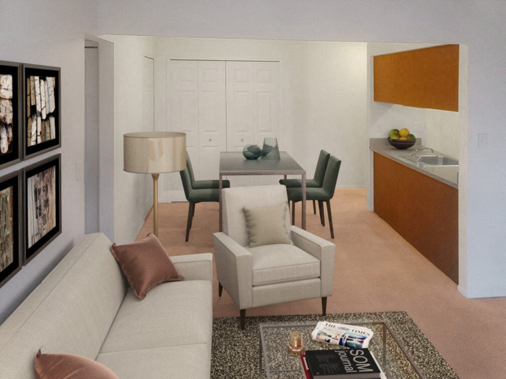 Área de comedor modelo con vista al iris - Eastgate Woods Apartments