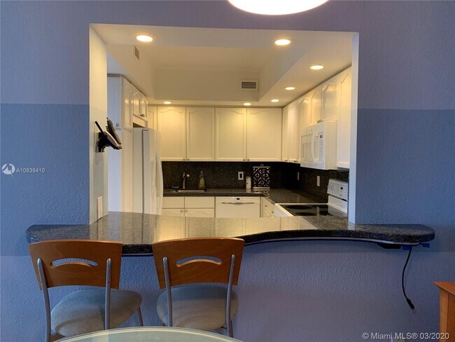 Building Photo - 5600 Collins Ave