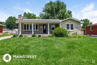 Building Photo - 8003 Canna Dr