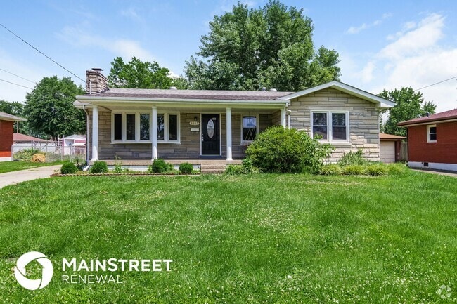 Building Photo - 8003 Canna Dr