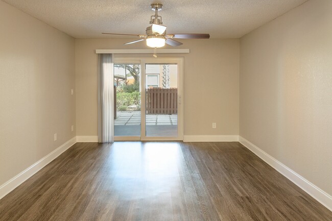 Living Room with wood plank flooring - Sun Bay Palms at South Tampa