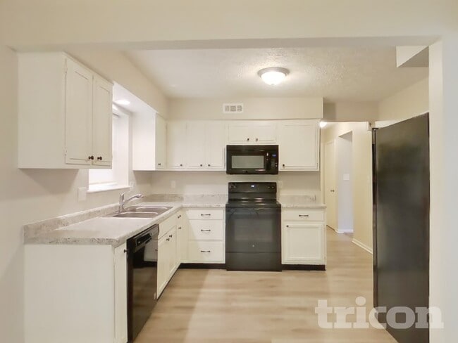 Building Photo - 6907 Tartan Ct