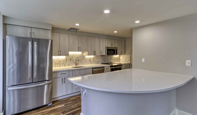 Select homes feature upgraded kitchens with quartz countertops - The Sterling