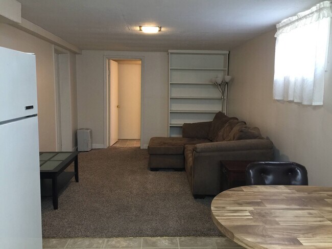 Living room - door goes to bathroom and laundry - 3009 17th St