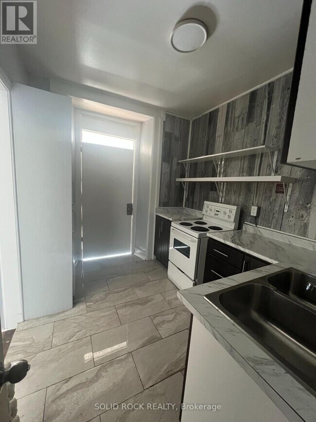 Photo du bâtiment - 89 King St W