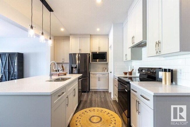 Photo du bâtiment - 32 Rosewood Wy