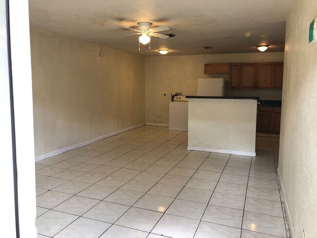 Building Photo - Large 2-1 apartment with New Impact window...