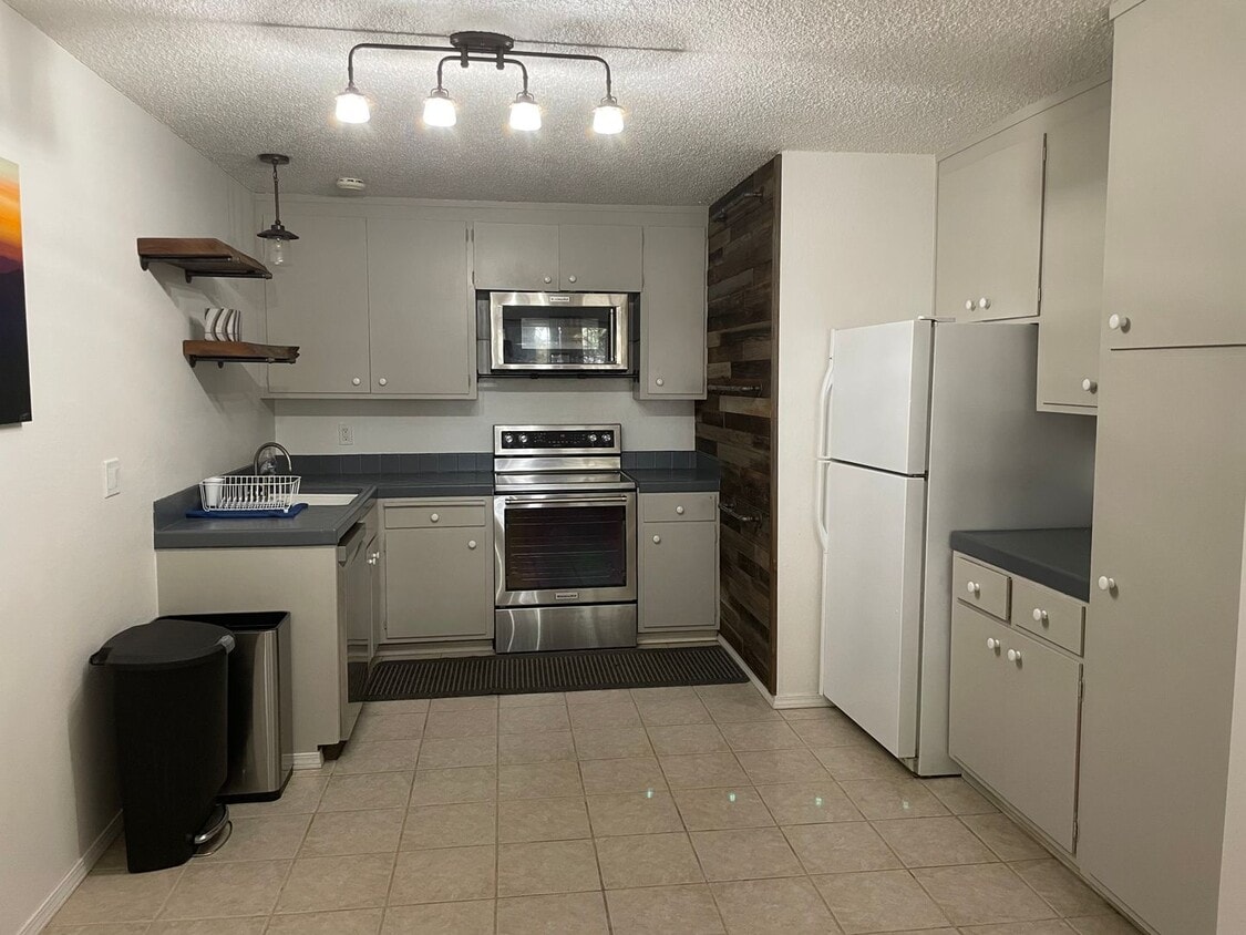 Primary Photo - Quiet Corner Unit in Condo Complex