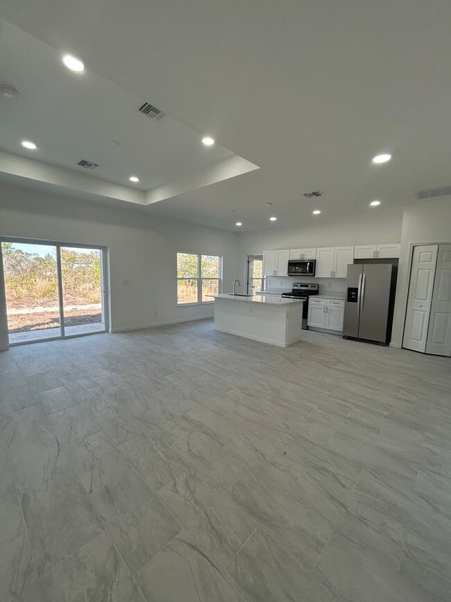 Building Photo - BRAND NEW Modern 4BR/2BA Home with Garage – Peaceful Lake Placid Retreat