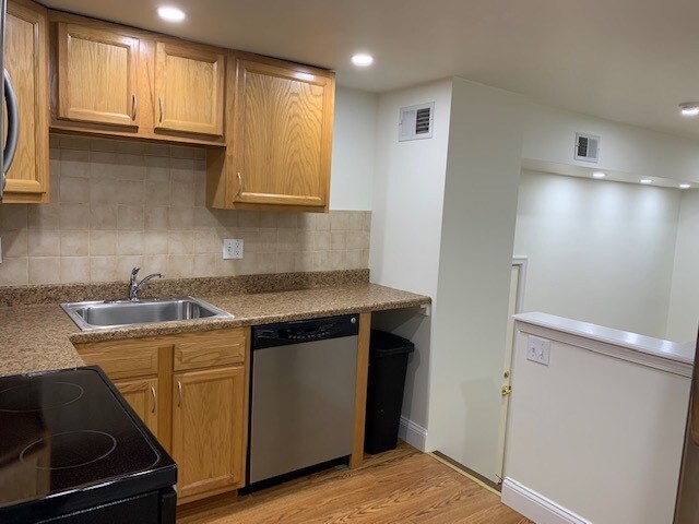 Kitchen with steps to Living Room Area - 149 N 21st St