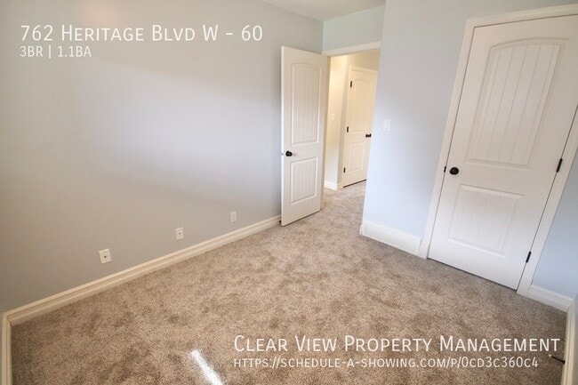 Building Photo - Beautiful 3 bedroom, 1.5 bathroom condo lo...
