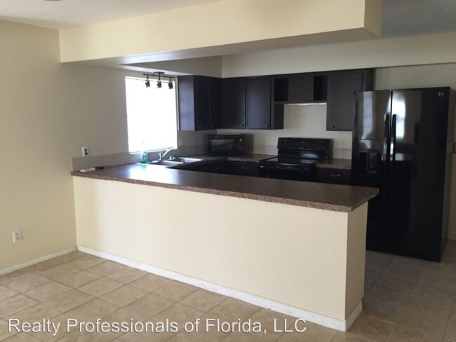 Foto del edificio - 4900 N Apopka Vineland Rd
