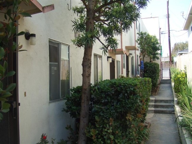 Walkway to Apartments - 7711 W Manchester Ave