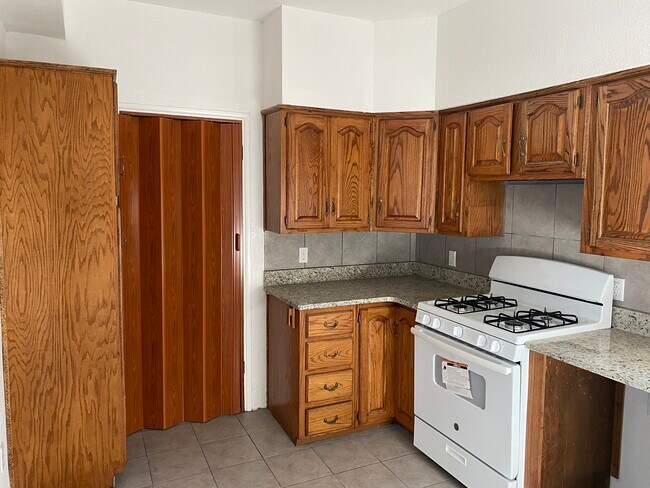 New stove and fridge included. - 2424 Gold Ave