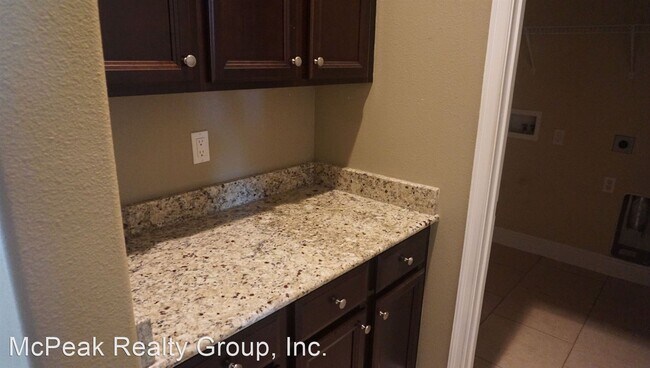 Foto del edificio - 4 br, 3 bath House - 6819 Park Strand Dr