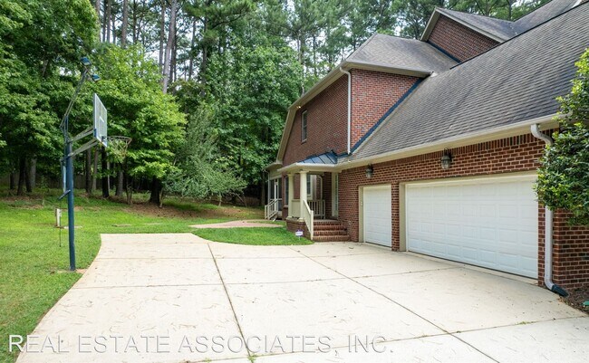 Building Photo - 4 br, 4.5 bath House - 7600 Rhone Court