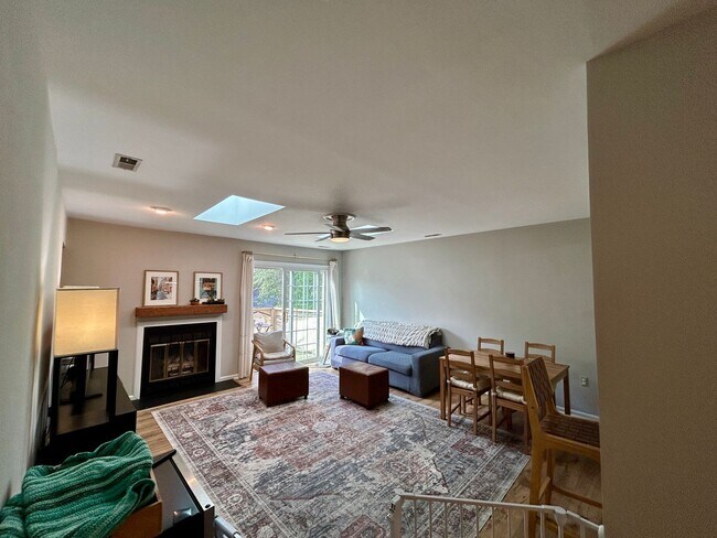 Building Photo - 3BR End Unit w/ Garage, Deck, Patio & 2 Fireplaces, Private fenced Backyard