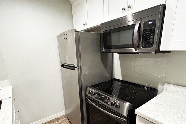 Kitchen with stainless steel appliances - 525 S Ardmore Ave