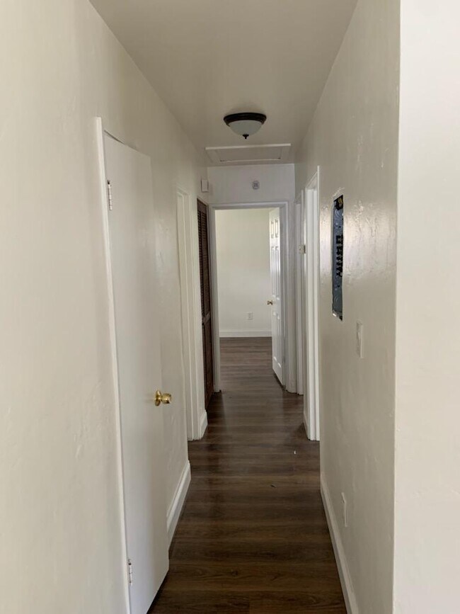 Hallway for all 3 bedrooms and main bathroom - 3907 W Pine St