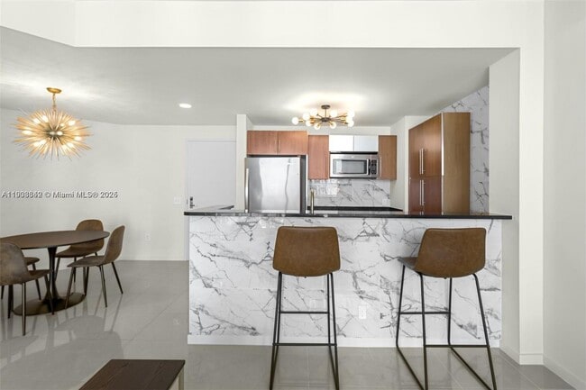 Building Photo - 300 S Biscayne Blvd