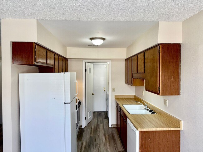Building Photo - Updated Two Bed Townhome Nestled in the He...