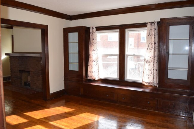 Dining with hardwood floors and built-in cabinet - 1382 Webb Rd