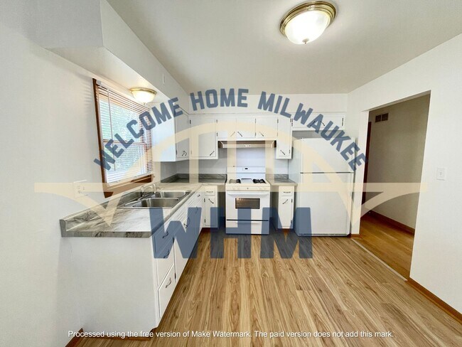 Building Photo - Lower Unit Oasis Awaits: Bay View Gem with...