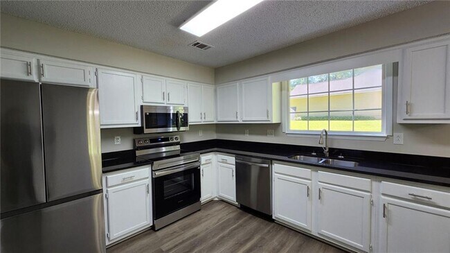 Foto del edificio - 7847 Sugarland Dr