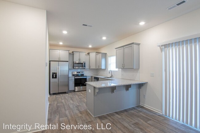 Building Photo - 3 br, 2.5 bath House - 7014 Duncan Acres D...