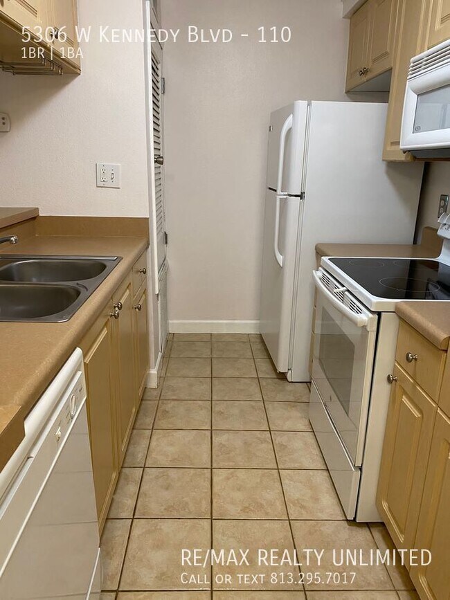 Building Photo - 5306 W Kennedy Blvd #110 Tampa 33609 (Sien...