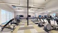 Located at 6 Crossgates Mall Rd in Albany, NY, this modern fitness center offers a well-appointed, single-floor layout designed to support a full range of workout activities. The facility is accessed through a bright entrance featuring floor-to-ceiling glass double doors that flood the space with natural light and provide views of the surrounding outdoor area.

The expansive exercise room is divided into distinct functional zones. The cardio section is equipped with multiple treadmills, elliptical trainers, and stationary cycling bikes, all arranged in front of large wall-mounted mirrors that amplify the sense of space. Flat-screen TVs are mounted throughout for entertainment during workouts. A dedicated strength training area features a variety of cable machines, adjustable benches, and free weights, positioned alongside generous floor-to-ceiling windows that bring in natural light and outdoor views.

A separate open studio space is finished with light wood-style flooring, offering an ideal setting for group fitness classes, yoga, or stretching. This area features soaring ceilings, sleek linear pendant lighting, and exposed ductwork that lends an industrial-modern aesthetic. Ceiling fans throughout promote comfortable airflow. The patterned carpet tile flooring in the main exercise room adds visual interest while the overall design palette of neutral whites and grays creates a clean, motivating environment.