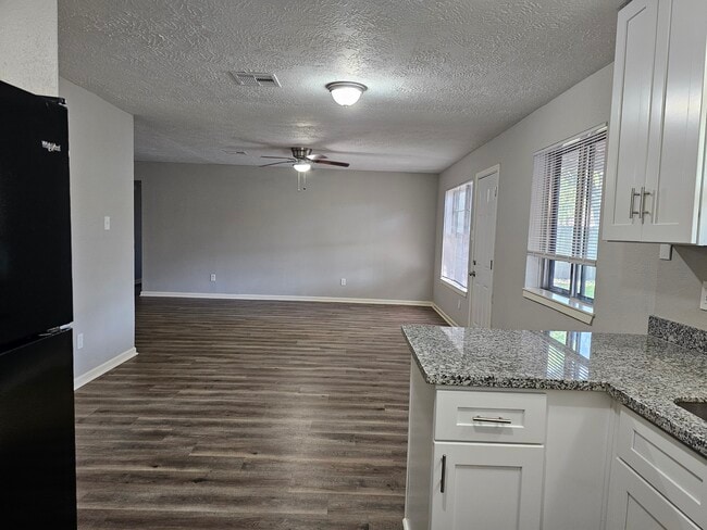 looking into living room from kitchen - 9806 Thrush St